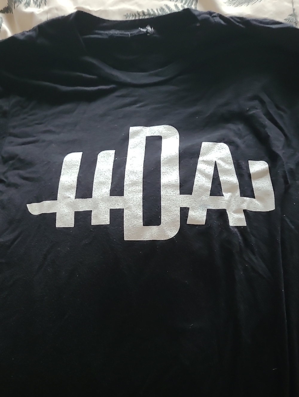 Black Graphic Tee with White Metallic Logo